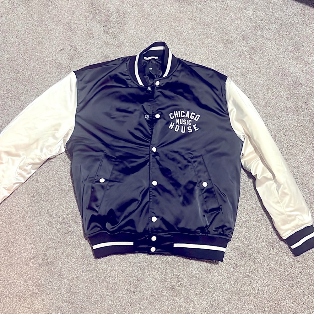 Black jacket with white sleeves light weighted and warm